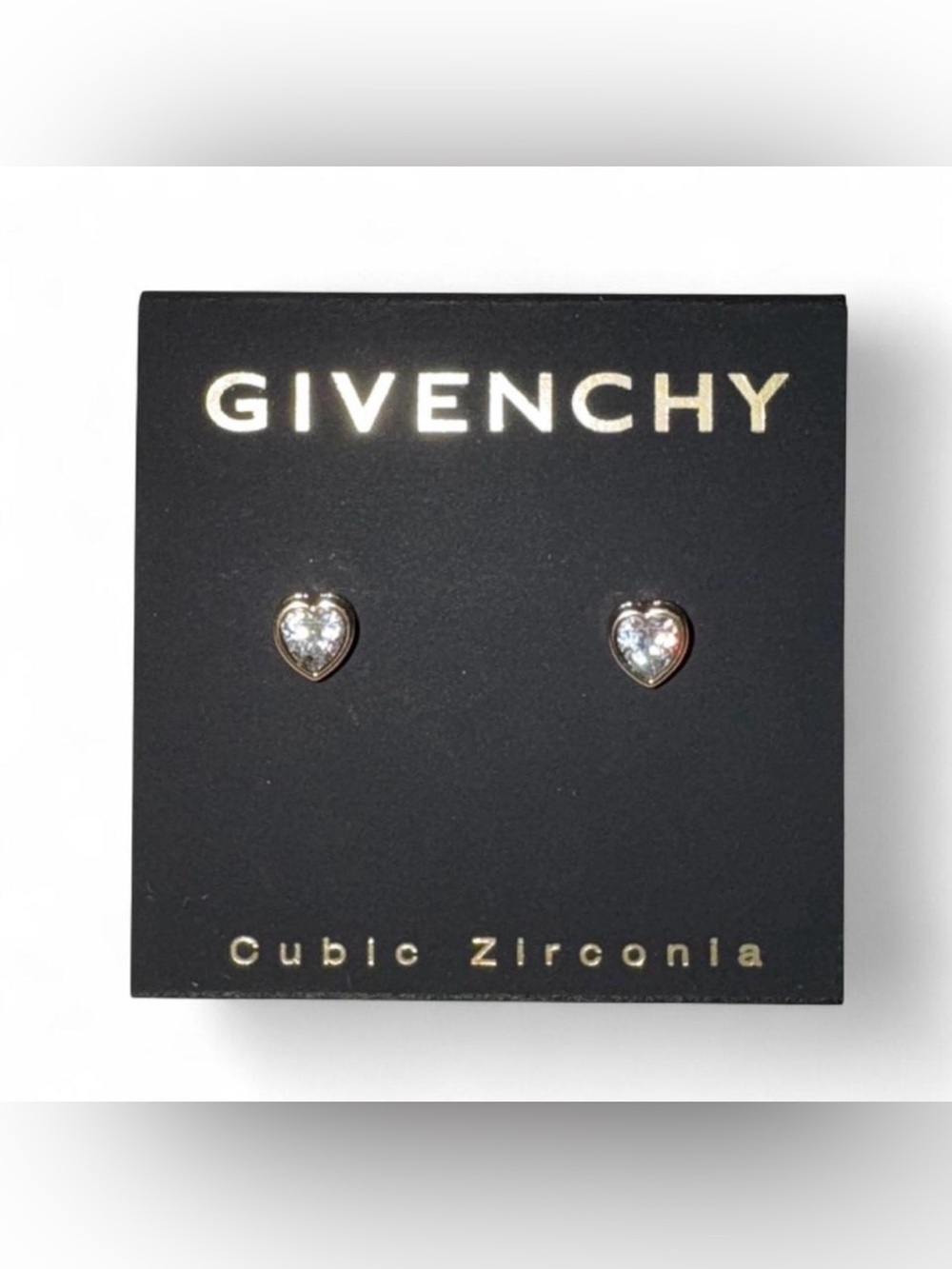 Givenchy stud earrings, featuring a heart-shaped cubic zirconia stone